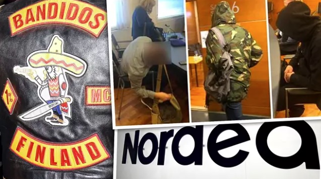 Epäilyn mukaan Nordean työntekijä oli valmis turvautumaan jopa Bandidosin apuun. Kuvan laitimmaiset miehet ovat Nordean työtekijöitä, keskellä oleva mies on Tor-verkosta hankittu apuri.KUVA: NIKO RANTA / IS, LEHTIKUVA