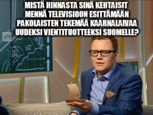 Kaarnis kauniissa silakan kädessä.jpg