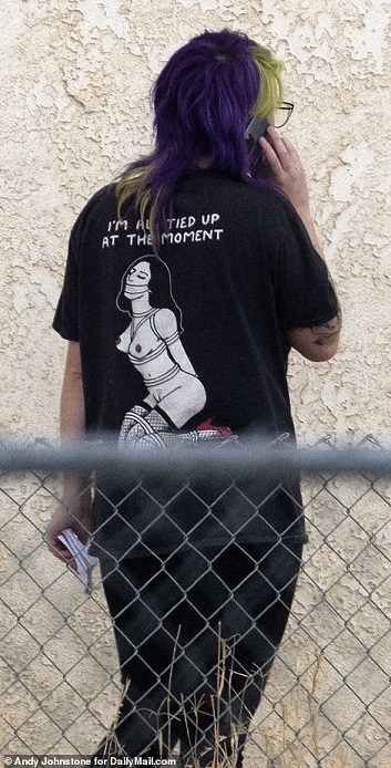 49638603-10134061-The_24_year_old_was_seen_wearing_all_black_with_a_T_shirt_pictur-a-46_1635292069079.jpg